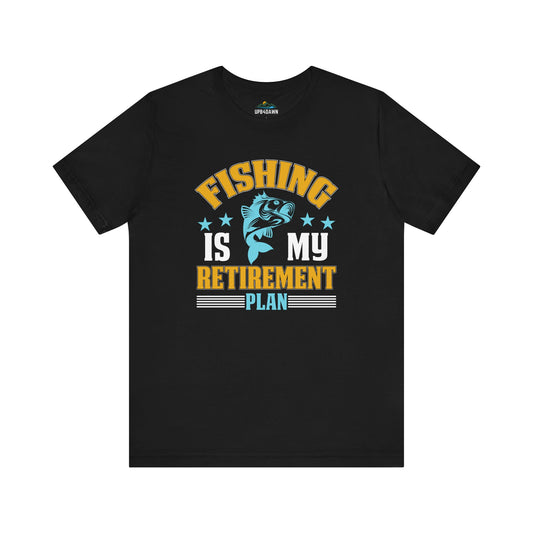 Black t-shirt with a graphic design featuring the text "fishing is my retirement plan" in bold, stylized fonts, with an image of a fish surrounded by blue and yellow colors. Ideal for Fishing is My Retirement Plan - T-Shirt