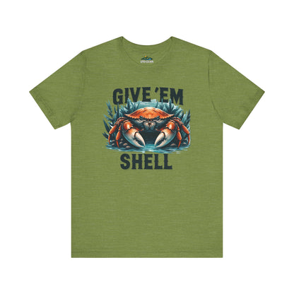 A gray unisex Give 'Em Shell - T-Shirt featuring a graphic of a large crab holding a baseball in its pincers, with the text "give 'em shell" in bold letters above and below the crab.