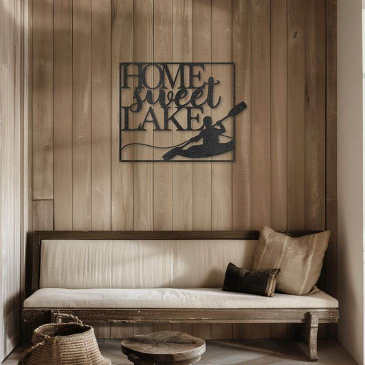 Kayaking laser-cut steel sign on rustic wall displaying "Home Sweet Lake" theme.