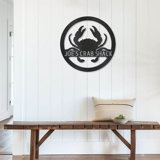 Customizable laser-cut steel sign with intricate crab design, featuring coastal elegance and personalized monogram.