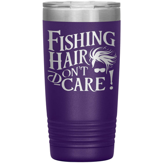 A tall, durable tumbler with a silver lid. This purple, stainless steel travel essential features white text and a fun graphic that says "Fishing Hair Don't Care!" along with a stylized drawing of messy hair. This is the Fishing Hair Don't Care - Laser Etched Tumbler - 20oz.