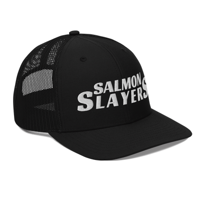 A black and gray mesh Salmon Slayers - Richardson 112 - trucker cap with the words "salmon slayers" embroidered in bold, white letters across the front.