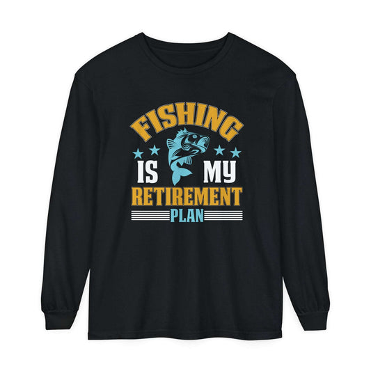 A black unisex long-sleeve t-shirt with the text "Fishing is My Retirement Plan" in colorful retro-style font, featuring an illustration of a fish jumping above the text.